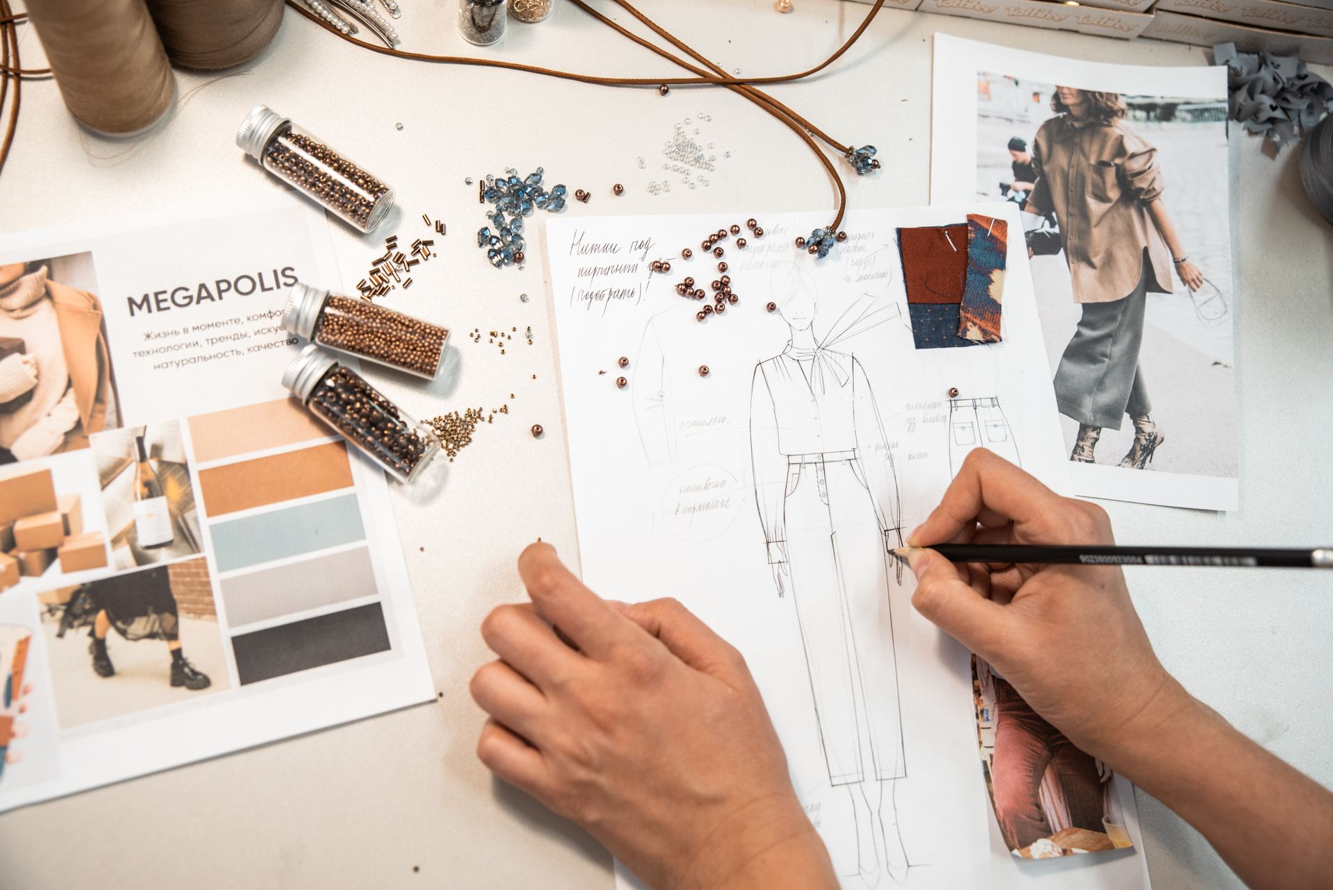 Creative workspace with sketches and moodboards